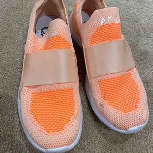 APL orange athletic shoes